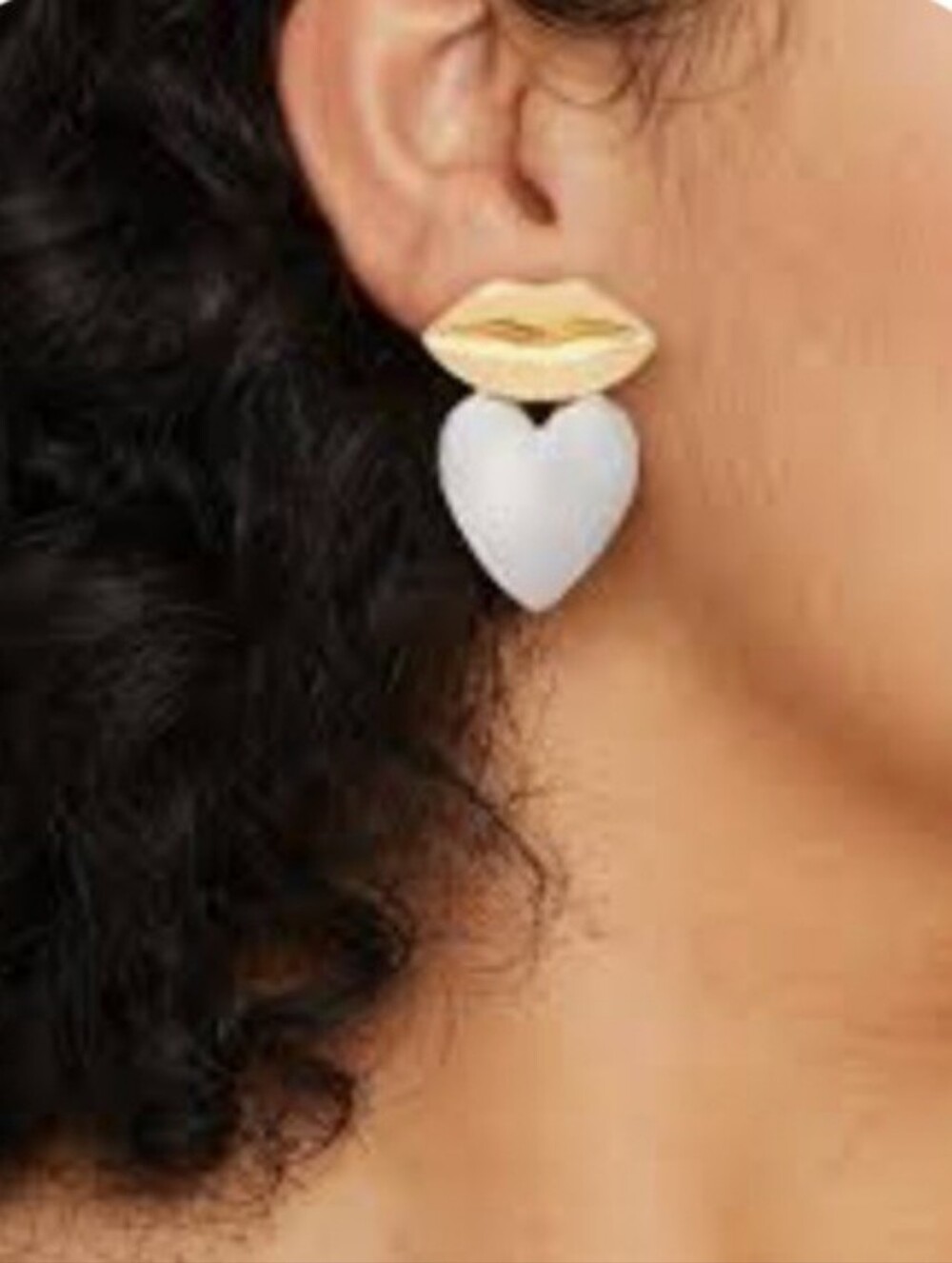 A New Day earrings feature a mixed metal design